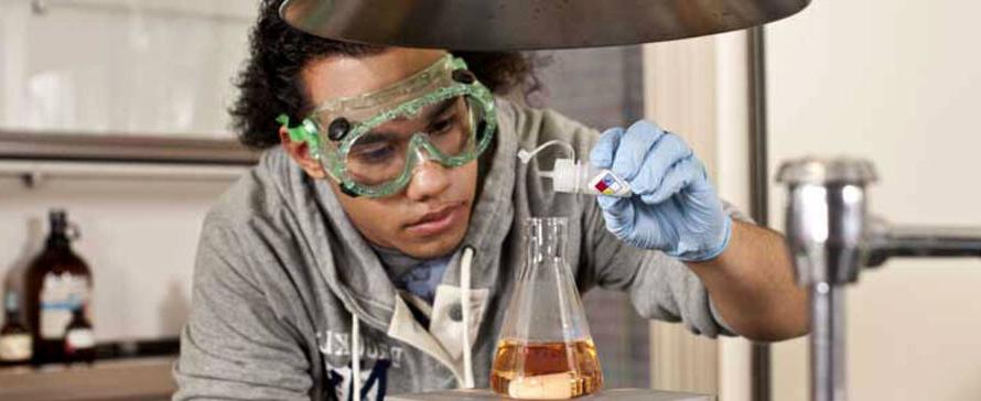 Photo of student in a lab